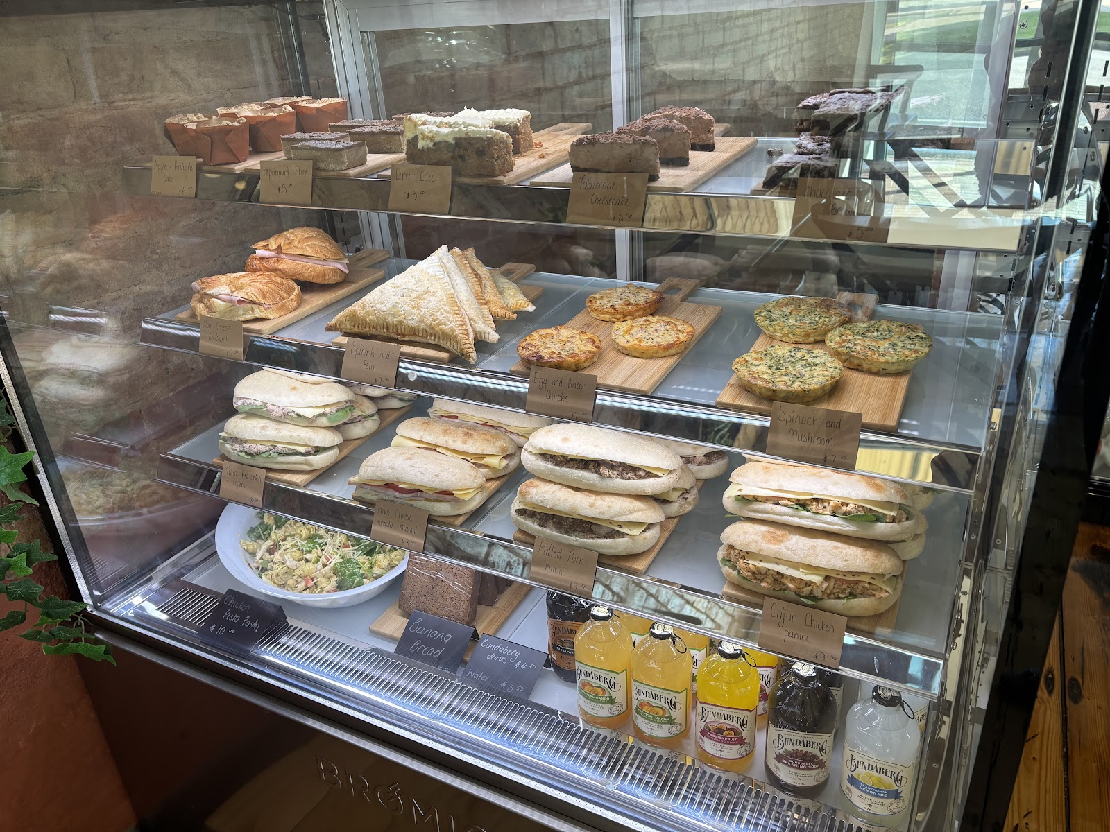 The Railway Cafe cabinet stocked with focaccias, sandwiches, quiches and cakes